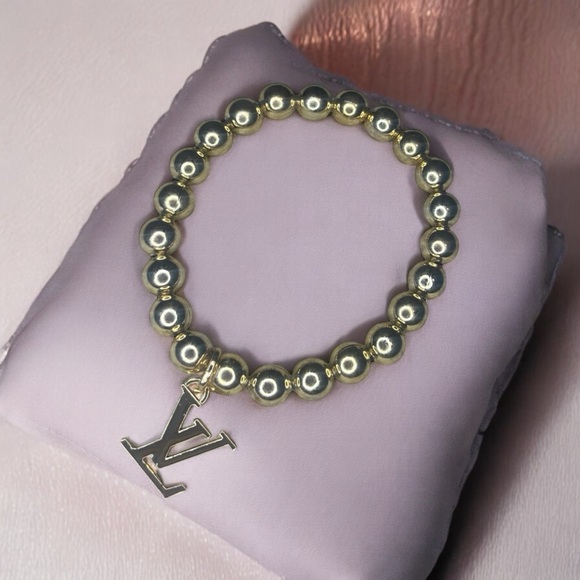 Gold Stamped Louis Vuitton Charm on a 8mm Beaded Bracelet - Picture 3 of 6
